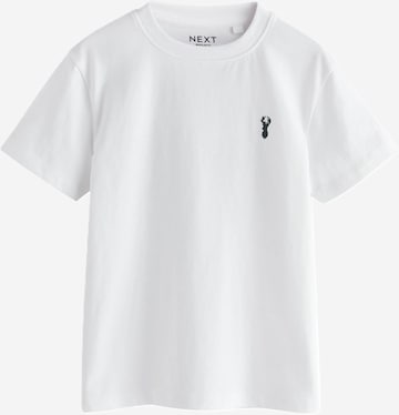 Tricou de la Next pe alb: față