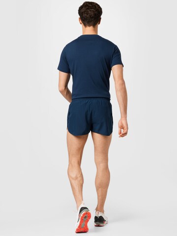 ASICS Slimfit Sportbroek in Blauw