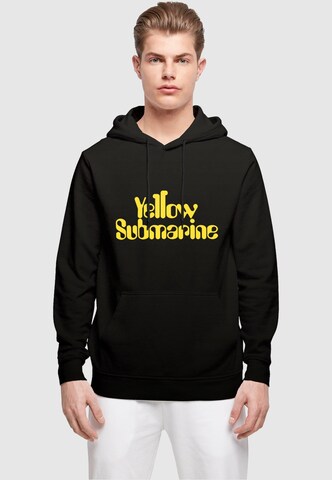 Merchcode Sweatshirt 'Yellow Submarine - Headline' in Schwarz: predná strana