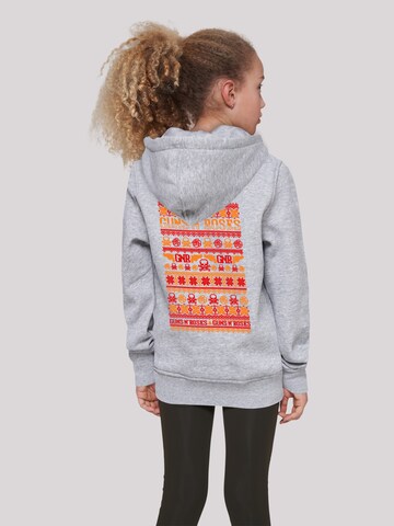 Pull-over 'Guns And Roses Weihnachten Christmas' F4NT4STIC en gris : devant