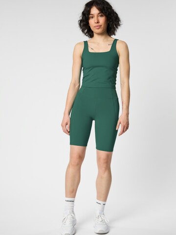 regular Pantaloni ' Compressive ' di Girlfriend Collective in verde: frontale