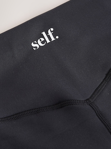 Skinny Pantaloni sportivi di self. in nero