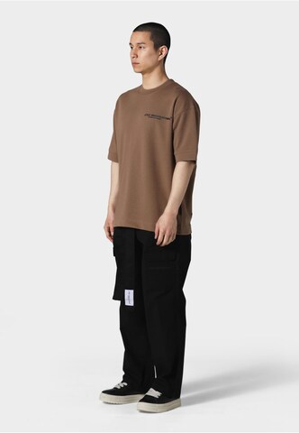 Irasuto Studios T-shirt 'Kao' i brun