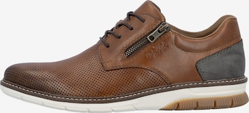 Chaussure basse 'Sneaker aus Clarino-Leder' Rieker en marron : devant