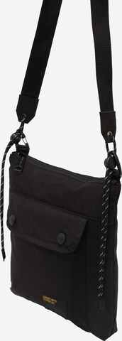 Carhartt WIP Чанта за през рамо тип преметка 'Haste' в черно