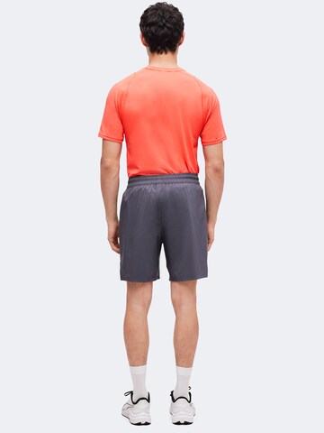 PUMA Regular Sporthose 'TAD FOUNDATIONS' in Grau