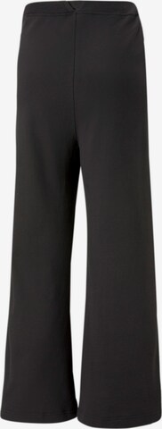 PUMA Loose fit Sports trousers in Black