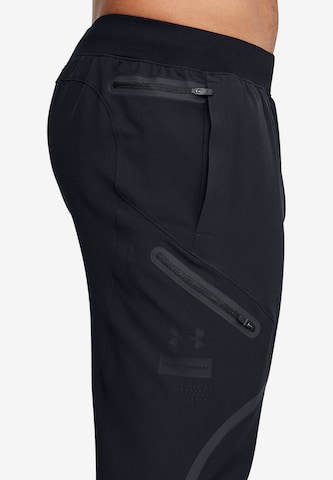 UNDER ARMOUR Regularen Športne hlače 'Unstoppable' | črna barva