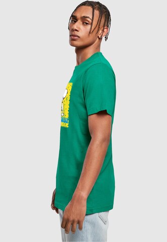 Merchcode T-Shirt 'Peanuts - Player' in Grün
