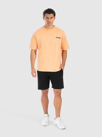 T-Shirt ' Cyris ' Smilodox en orange