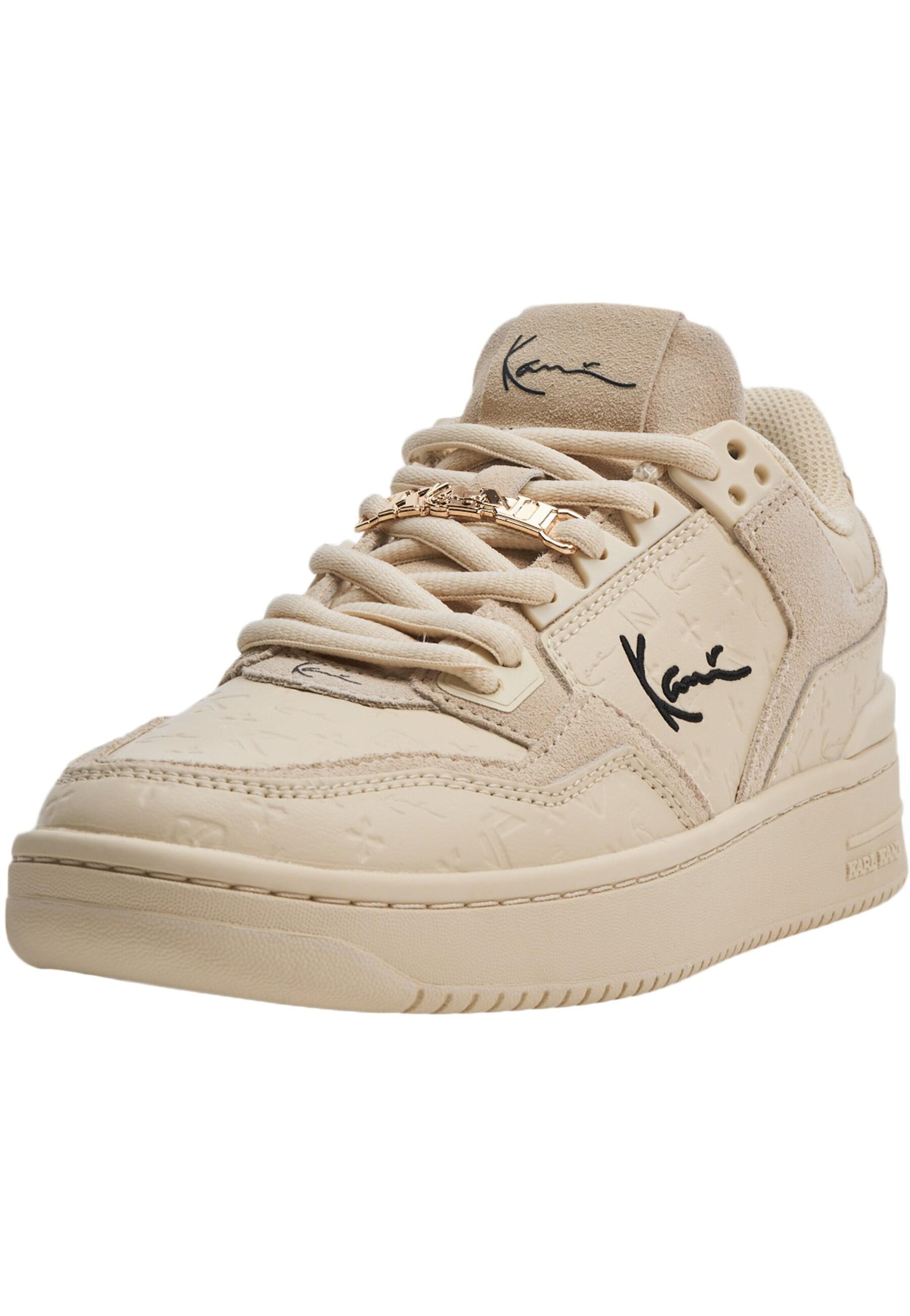 Baskets basses Karl Kani en beige : devant