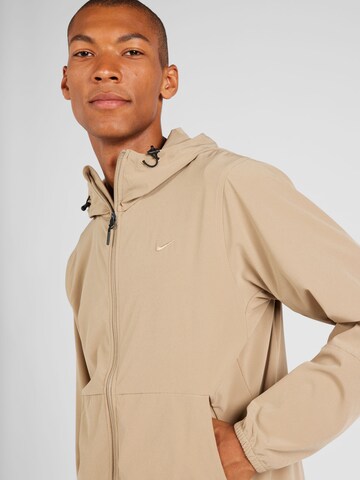NIKE Športna jakna 'Repel Unlimited' | rjava barva