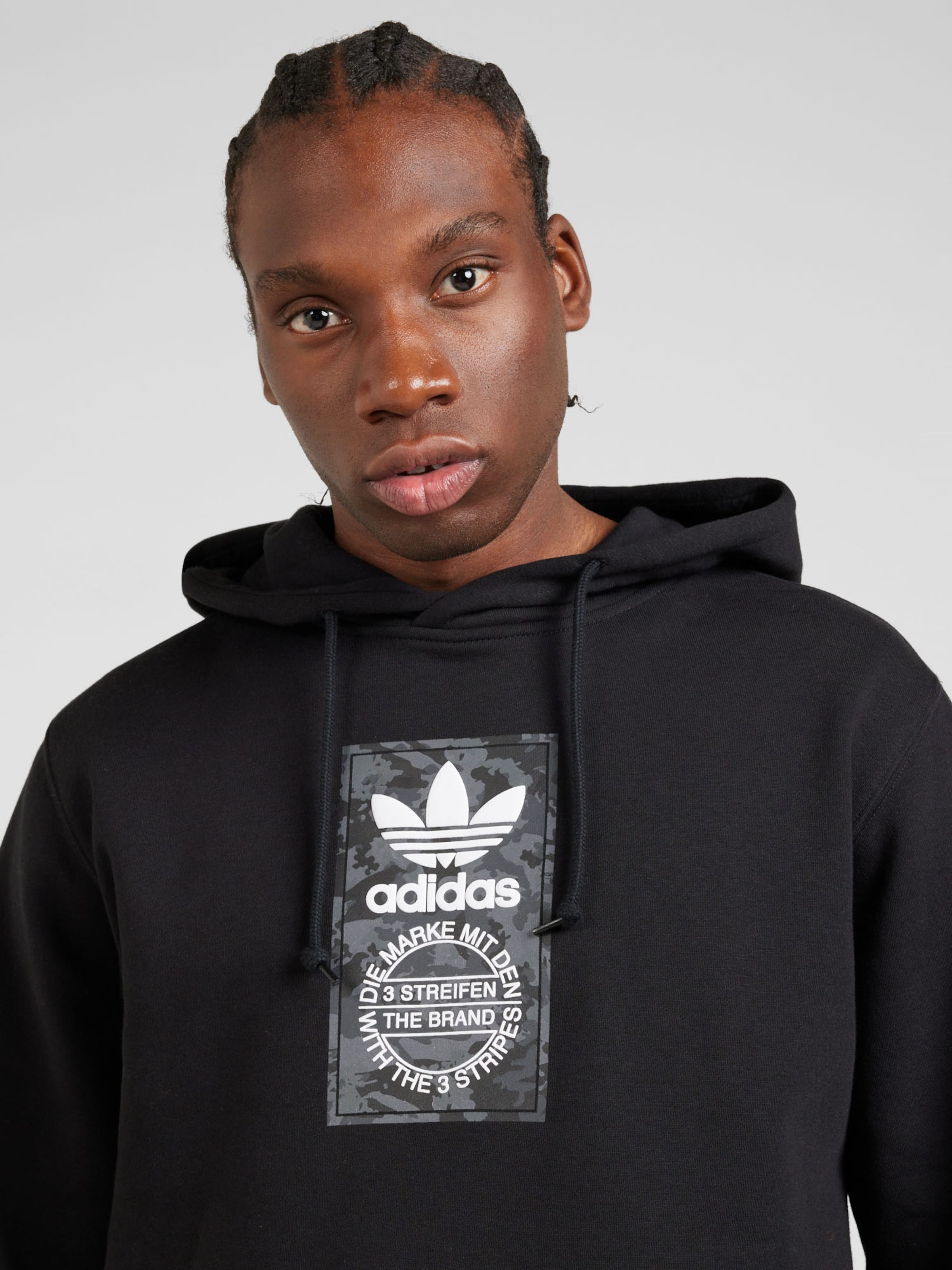 ADIDAS ORIGINALS Sweatshirt in Schwarz ABOUT YOU