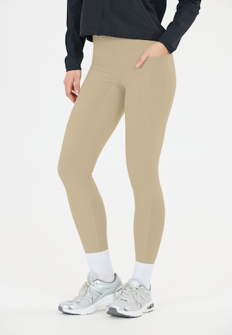 Athlecia Skinny Workout Pants 'Aliya V2' in Brown: front
