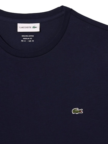 Maglietta di LACOSTE in blu
