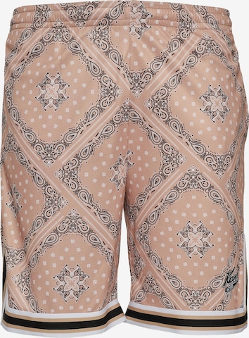 Karl Kani Loosefit Housut värissä beige: etupuoli