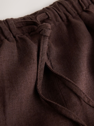 Loosefit Pantaloni di self. in marrone