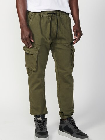 KOROSHI Tapered Cargobroek in Groen: voorkant