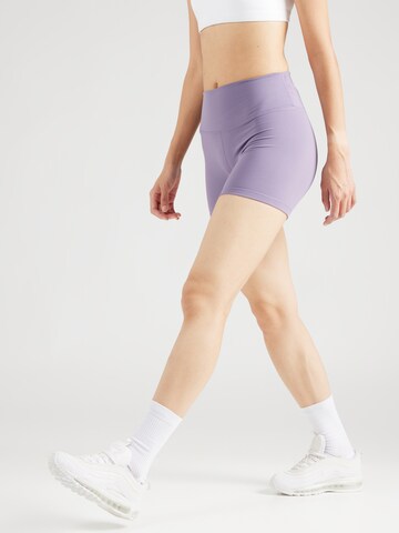 NIKE Skinny Workout Pants 'ONE' in Purple: front