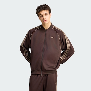 ADIDAS ORIGINALS - Chaqueta de entretiempo 'SST TT' en oro: frente