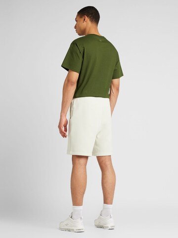 Nike Sportswear Ohlapna forma Hlače | siva barva