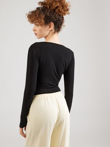 ABOUT YOU Κορμάκι-μπλουζάκι 'Isa' σε μαύρο