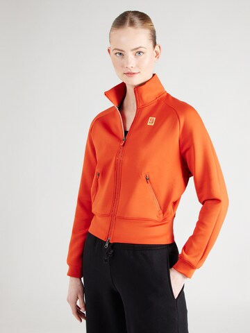 NIKE - Sudadera con cremallera deportiva en naranja: frente