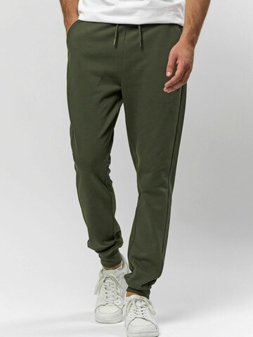 U.S. POLO ASSN. Tapered Bukser ' Terkel ' i grøn: forside