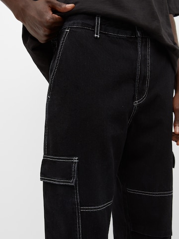 Loosefit Jeans cargo di Pull&Bear in nero