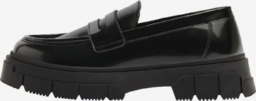 Bershka Slip-ons in Black: front