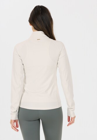 Athlecia Outdoorjas in Beige