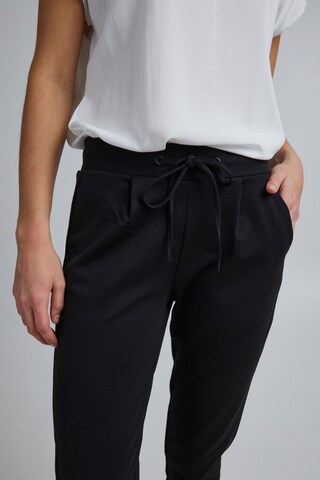 ICHI Slim fit Pleat-Front Pants 'KATE' in Black: front