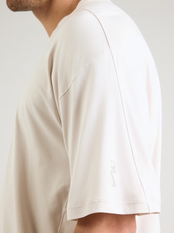 NIKE Funktionstopp '24.7 ImpossiblySoft' i beige