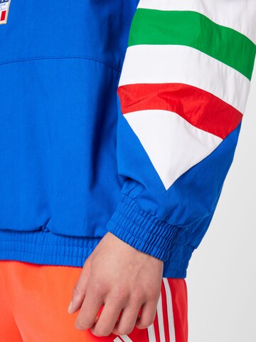 ADIDAS SPORTSWEAR - Casaco de treino 'Italien' em azul
