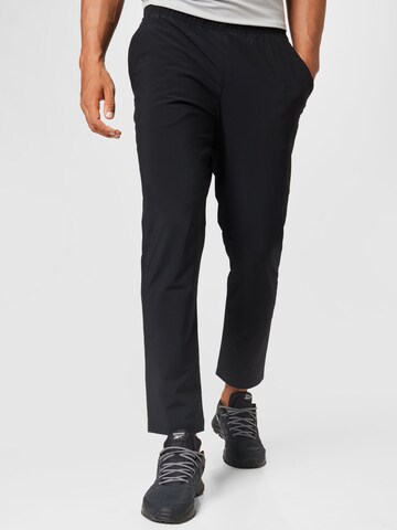 Reebok Tapered Workout Pants in Black: front