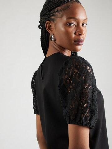 T-shirt 'Charlotta' ABOUT YOU en noir