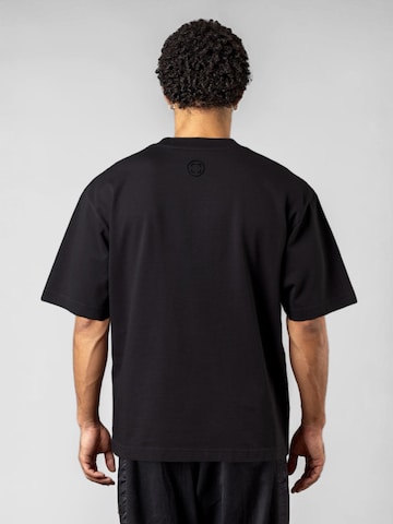 UNORGANIZED BRAND T-shirt 'SCHWERES COMFORT T15' i svart