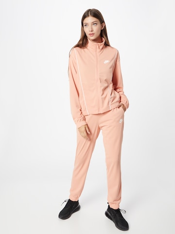 Nike Sportswear Φόρμα τρεξίματος 'Essential' σε πορτοκαλί: μπροστά
