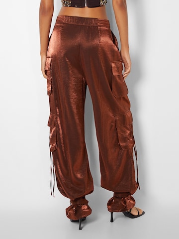 Effilé Pantalon cargo Bershka en orange