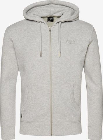 Veste de survêtement Superdry en gris : devant