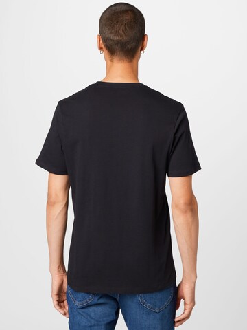 WRANGLER T-Shirt 'Sign Off' in Schwarz