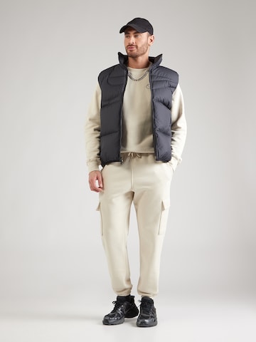 Nike Sportswear Tapered Nadrág 'CLUB' - bézs