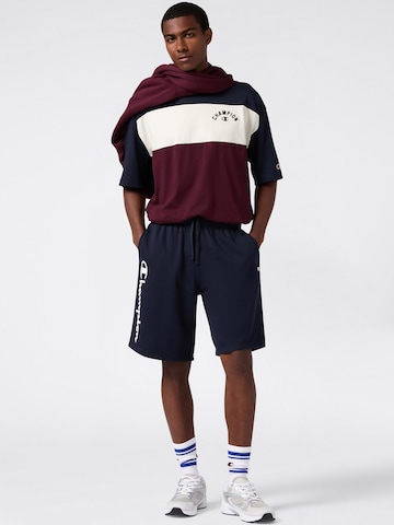 Champion Authentic Athletic Apparel Lużny krój Spodnie w kolorze niebieski