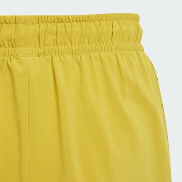 ADIDAS BY STELLA MCCARTNEY regular Παντελόνι φόρμας 'TruePurpose 2-in-1' σε κίτρινο