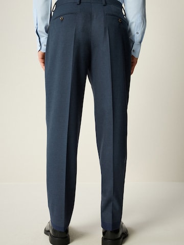 Coupe slim Pantalon à plis Next en bleu
