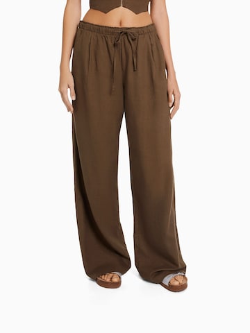 Bershka Szeroka nogawka Spodnie w kolorze brązowy: przód