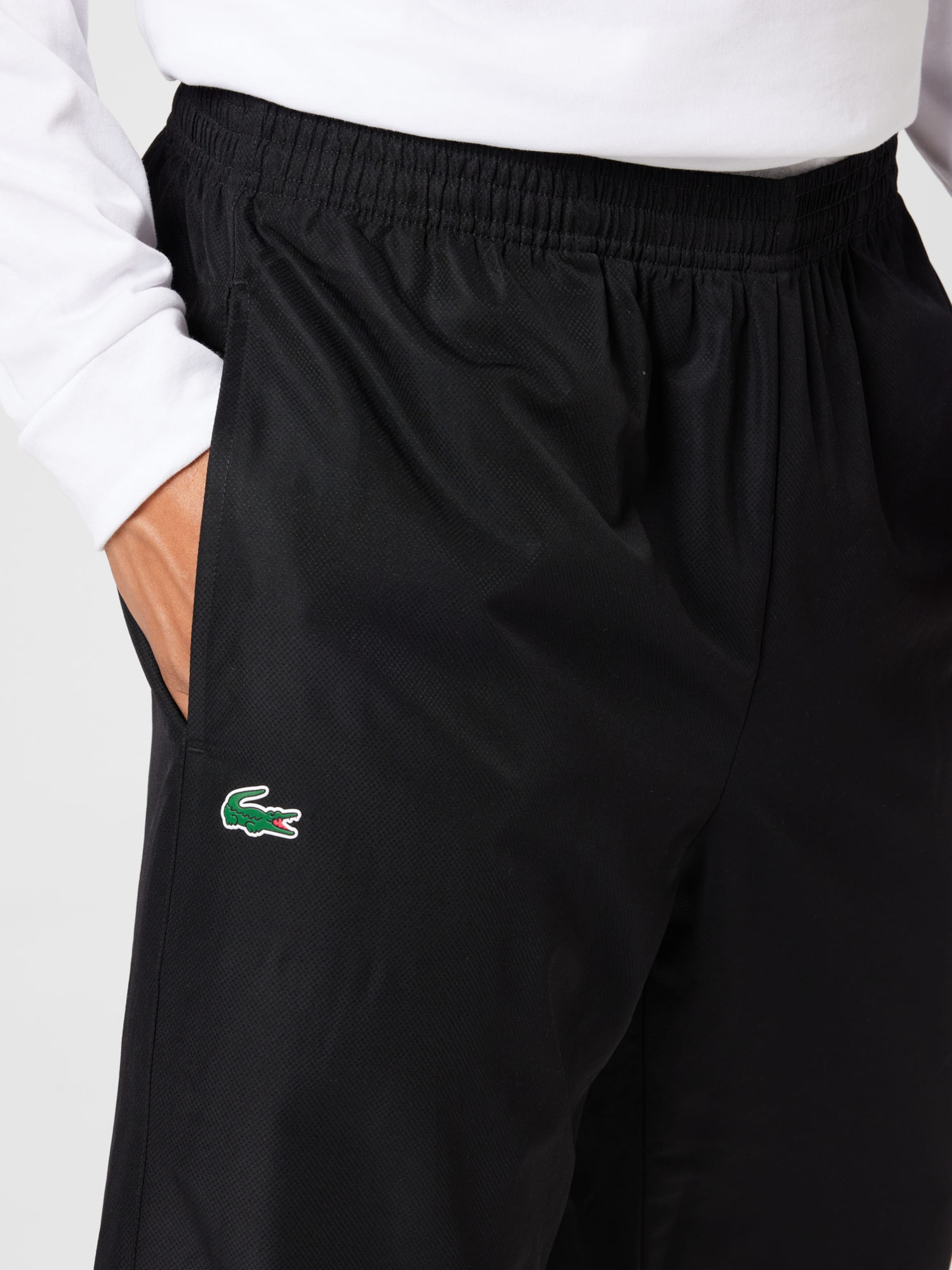 Lacoste Sport Tapered Workout Pants in Black ABOUT YOU