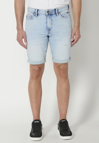 Slimfit Jeans de la KOROSHI pe albastru: față