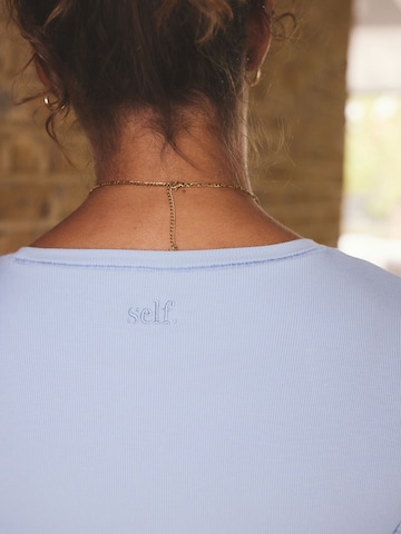 Shorty di self. in blu