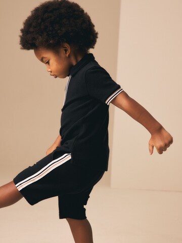 Next - Conjunto en negro